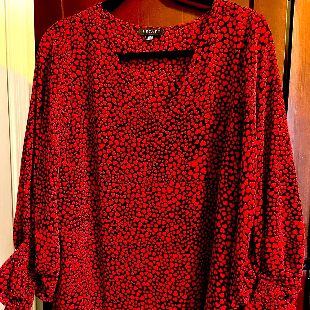 Red heart, billowing sleeves, v neck blouse.  Beautiful fit.